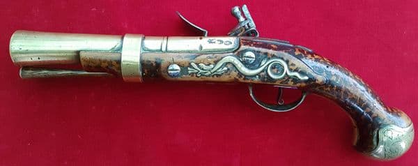 A good Flintlock brass barrelled Blunderbuss pistol by R Stringer dating from 1714. Ref 9532